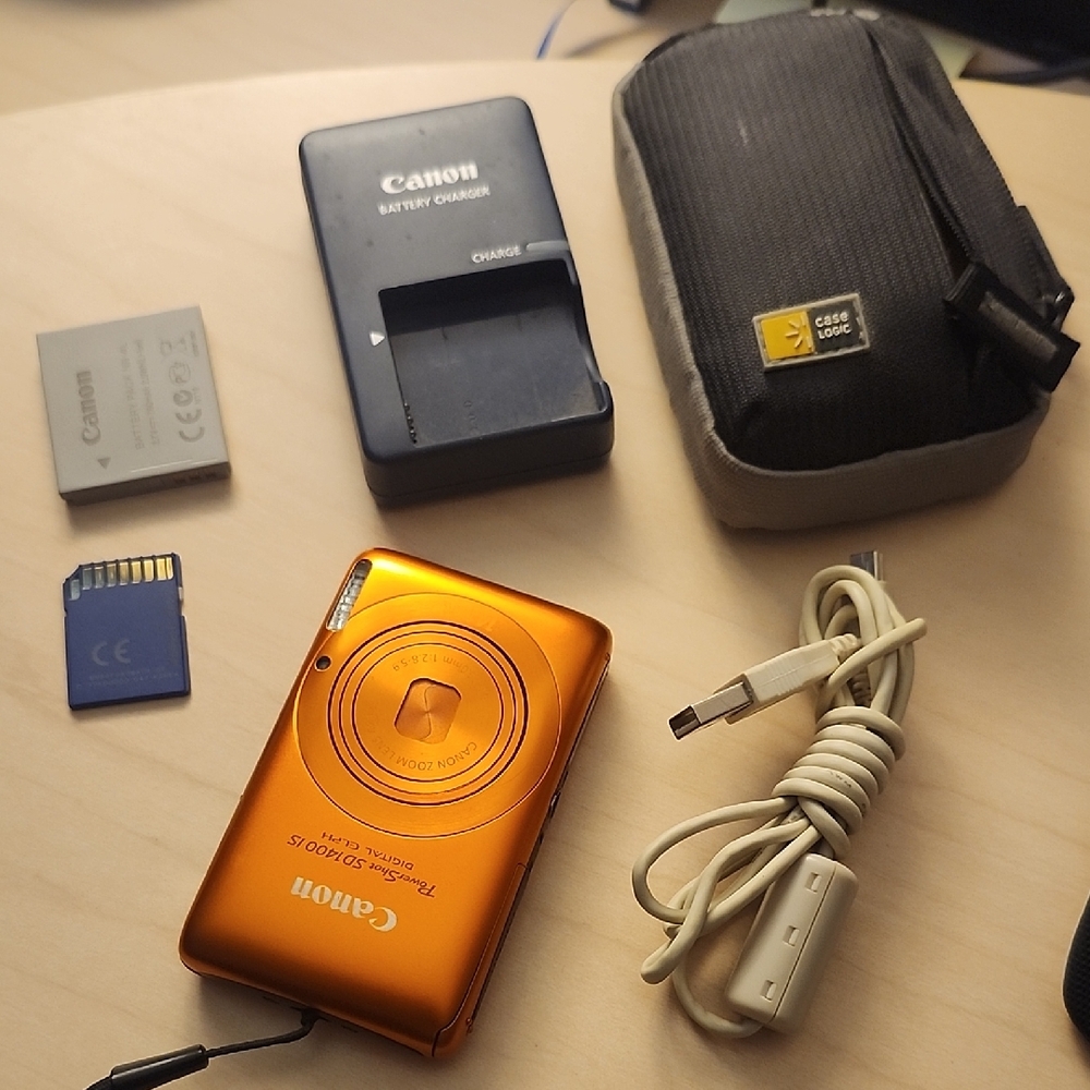 Canon Vibrant Orange Digital Camera with Accessories